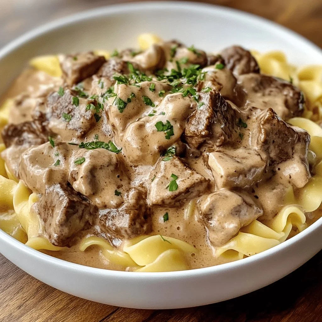 A delicious plate of Old Fashioned Beef Stroganoff served with pasta.