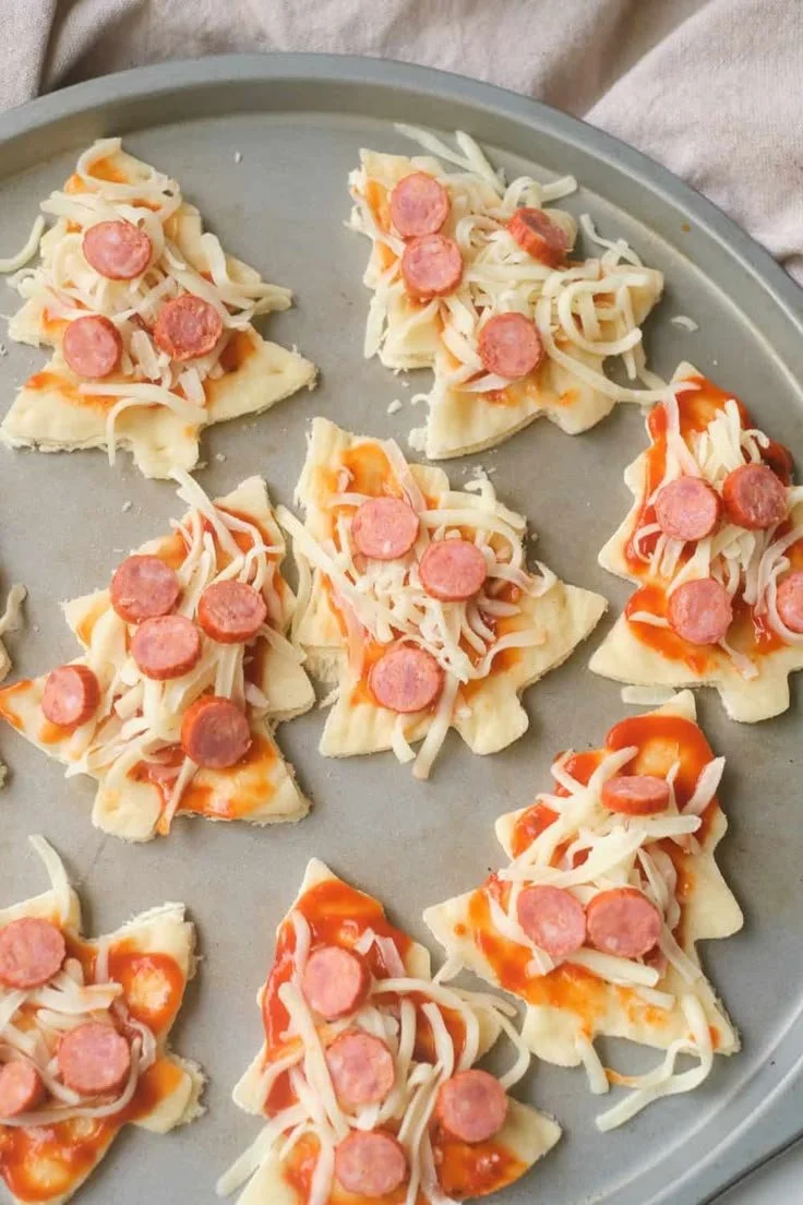Cute Christmas Tree Pizza served for a festive kids' dinner.